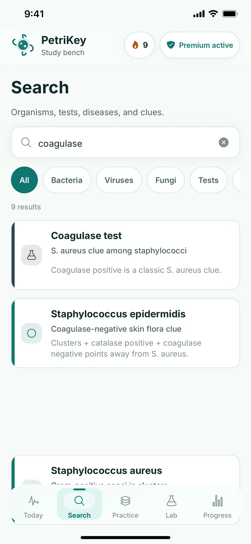 PetriKey atlas search for the clue coagulase, with category filter chips for bacteria, viruses, fungi and tests, and 9 results led by the coagulase test, Staphylococcus epidermidis with a coagulase-negative skin flora clue, and Staphylococcus aureus.
