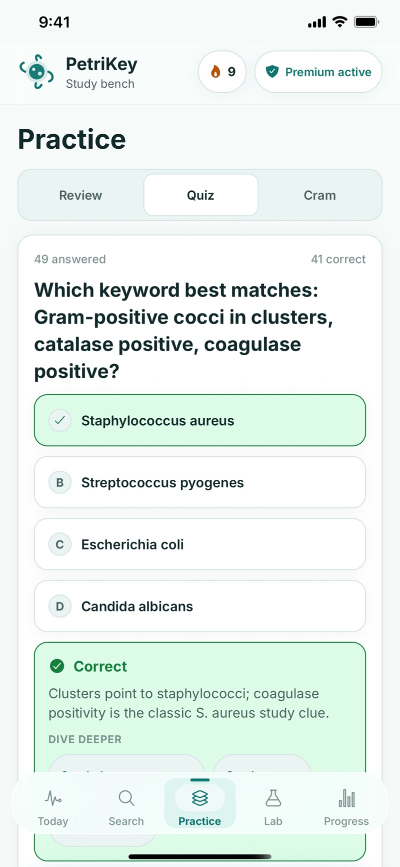 PetriKey quiz asking which keyword matches Gram-positive cocci in clusters, catalase positive, coagulase positive, with Staphylococcus aureus marked correct and a feedback panel explaining that coagulase positivity is the classic S. aureus clue.