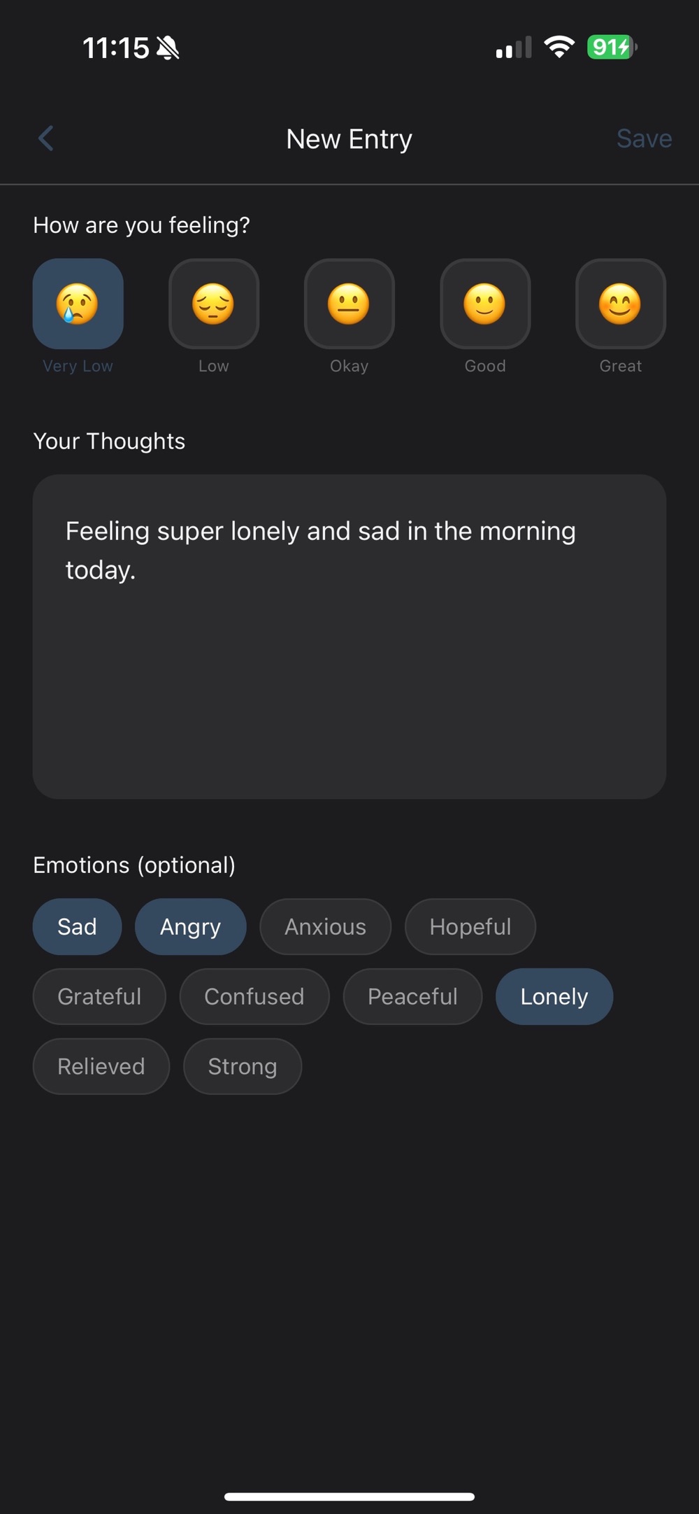 New journal entry screen asking how are you feeling with five mood faces from very low to great, a thoughts box containing the note feeling super lonely and sad in the morning today, and optional emotion tags with sad, angry and lonely selected.
